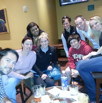 students sitting around table