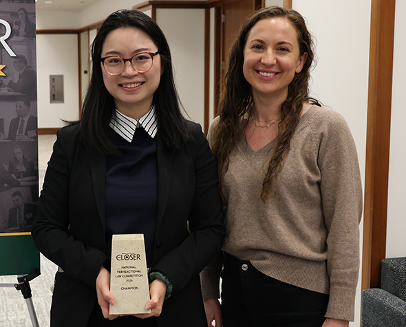Yan and Coriden with competition trophy