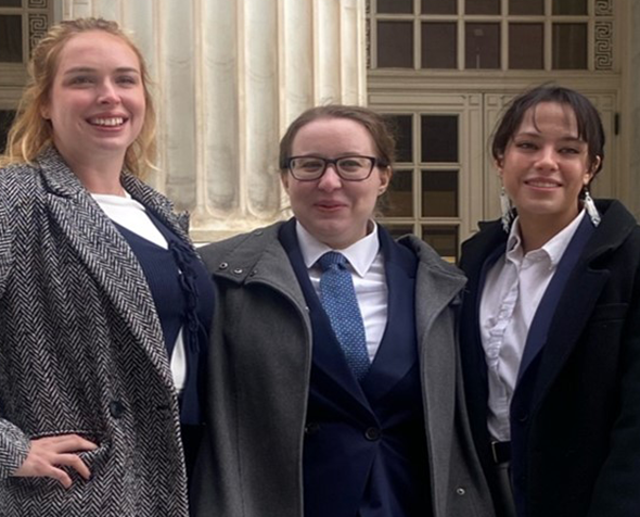 Three CRC students in front of courthouse
