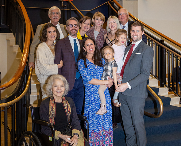 family group gathered on stairs