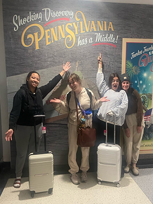 group photo in front of Pennsylvania backdrop