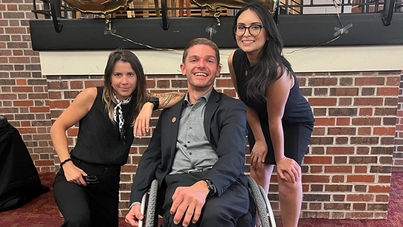 Three CRC students at Student Law Office event