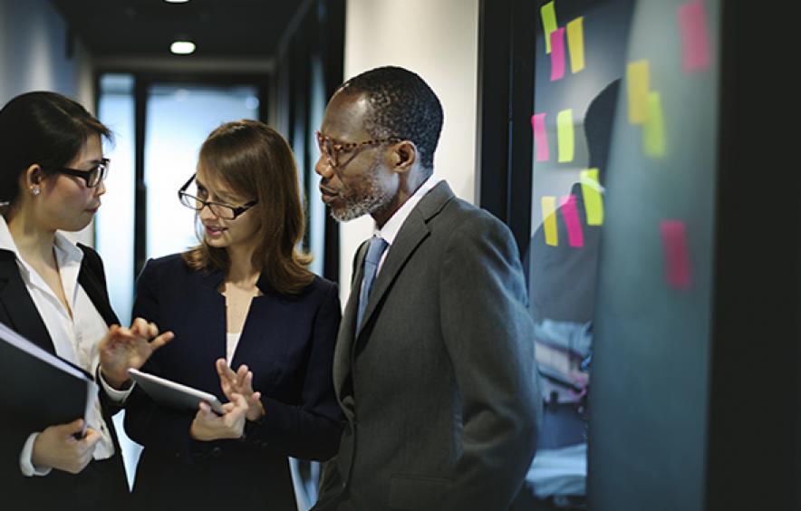 Denver Law student with attorneys in law office