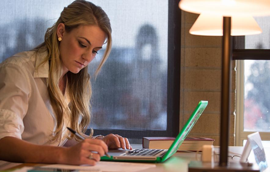 female working in Westminster Law Library