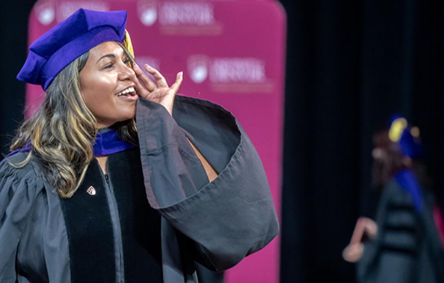 female Denver Law student at Commencement