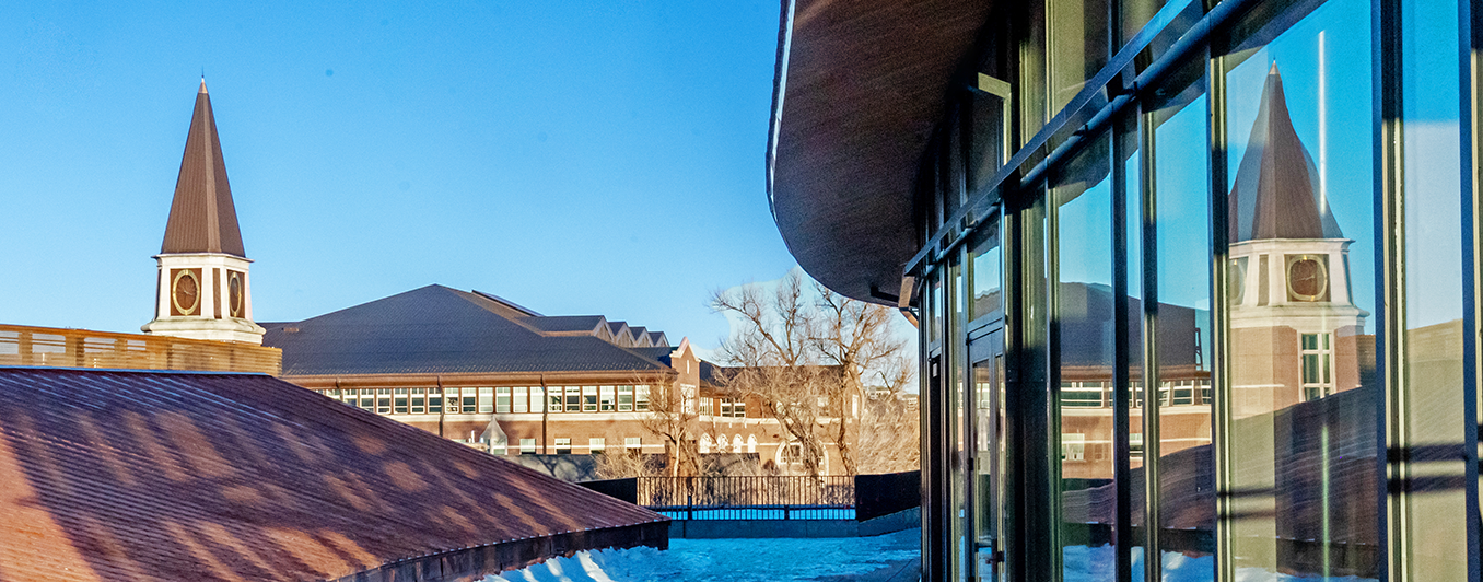 law building and reflection in window