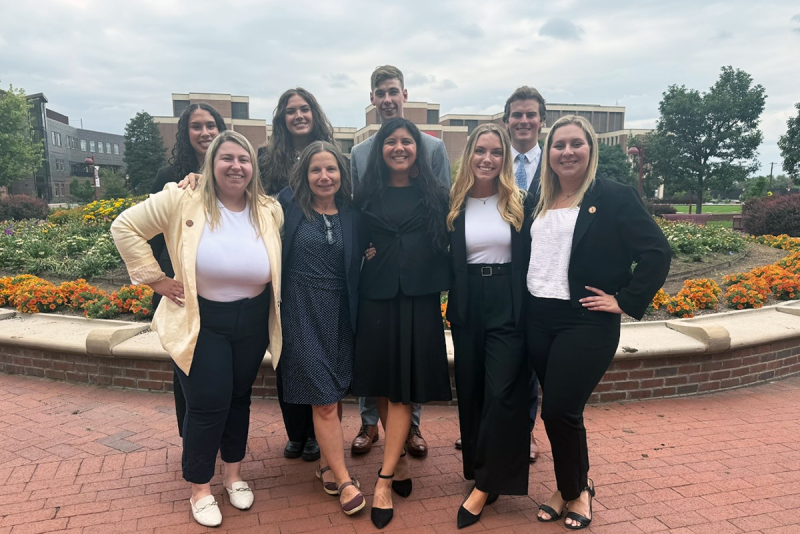 CLC group photo in front of law school garden