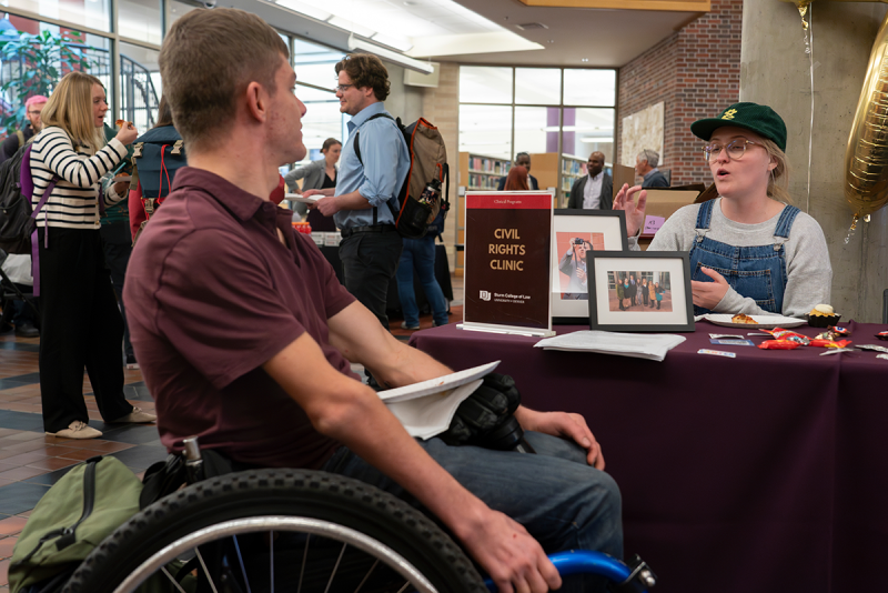 students at Civil Rights Clinic table