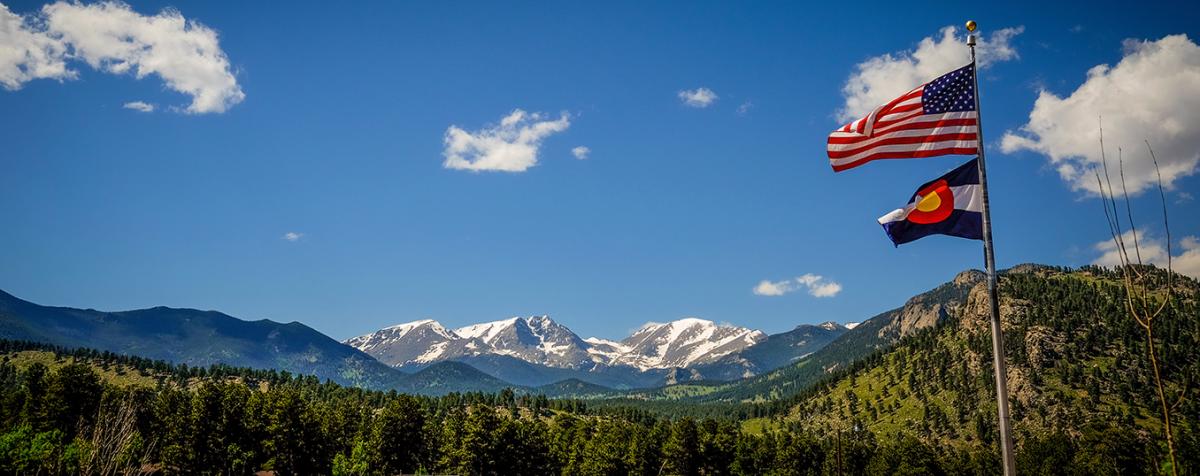 US Flag and mountains