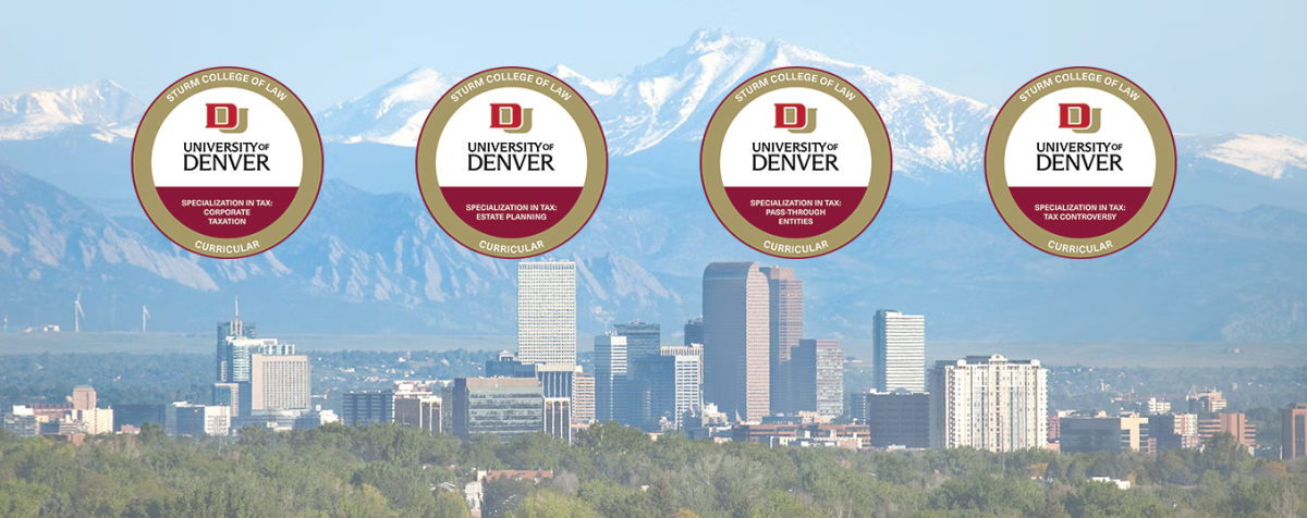 Tax badges in front of skyline with mountains