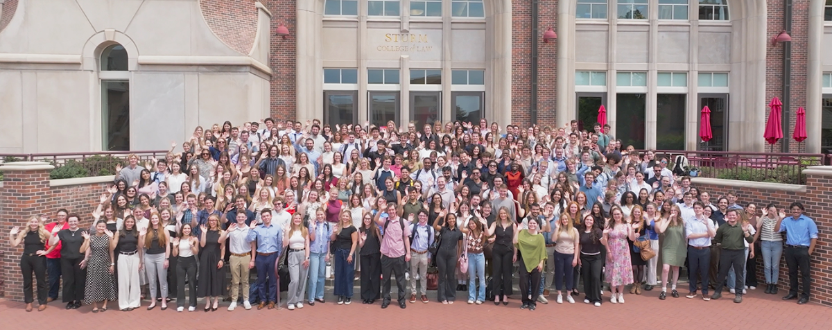 2025 incoming class group photo waving